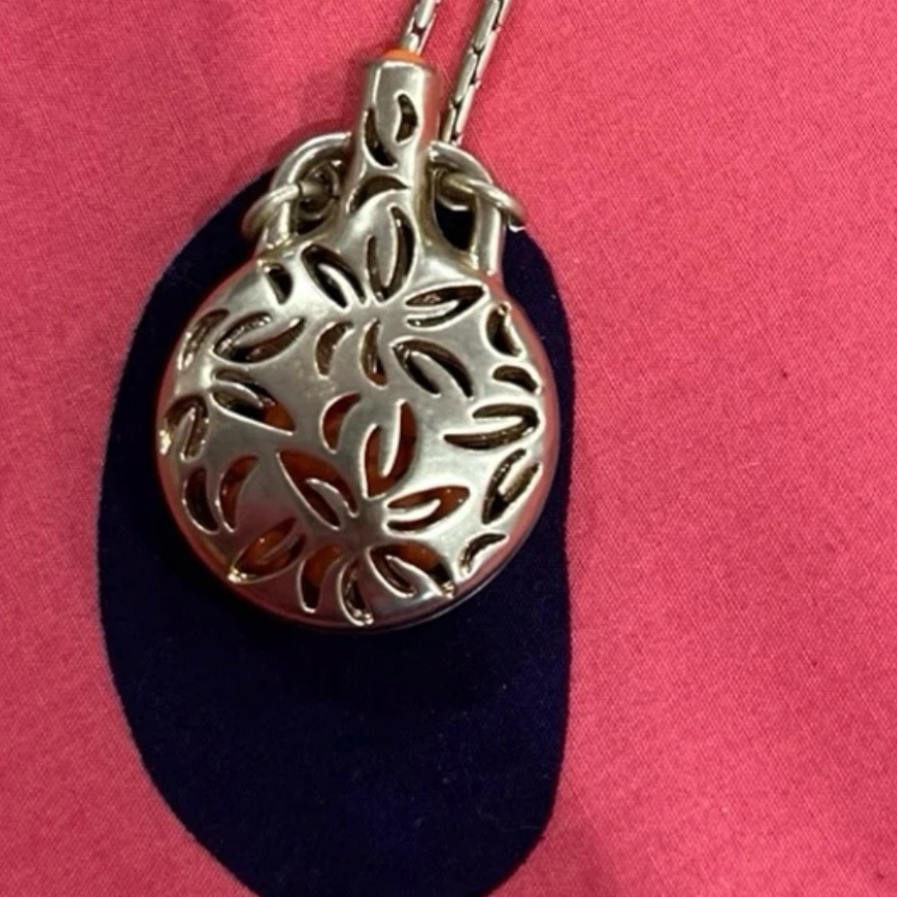 Lia Sophia Gold Necklace with orange accents.